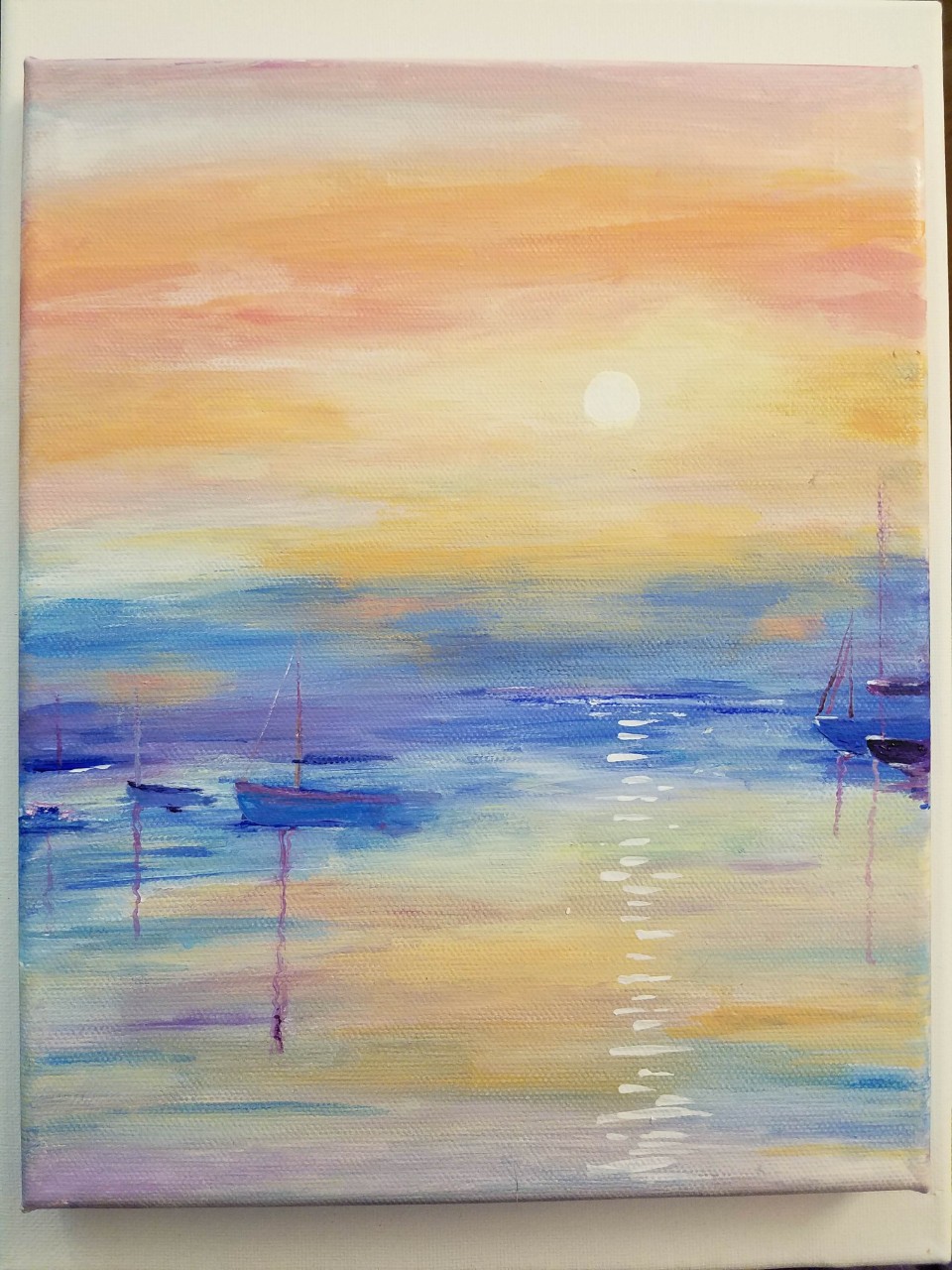 an abstract watercolor of sailboats on the water, against a yellow and orange sky.