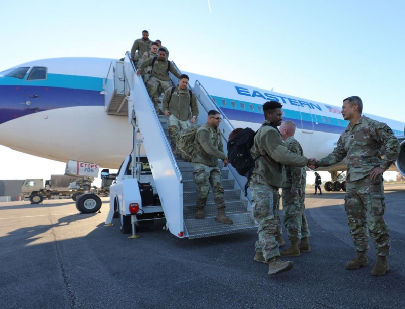 Tennessee National Guardsmen from the Memphis based 730th Composite Supply Company arrive at Berry Field in Nashville, Dec. 14, and are greeted by National Guard leadership following a successful 10-month deployment overseas. (photo by Sgt. 1st Class Timothy Cordiero)