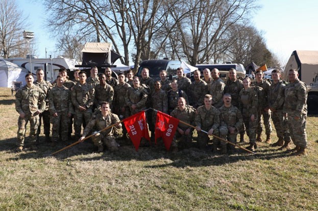 Members of Trenton’s 230th Engineer Battalion pose for a photo before participating in a 12-hour ruck march relay called the ‘Black Toe Run,’ in Watertown, Feb. 3. More than 25 Tennessee Guardsmen split into two-person teams and rucked for 12 hours straight, alternating one at a time, around a 5.1-mile trail at Hardin Farm. (Photo by Sgt. 1st Class Timothy Cordeiro)