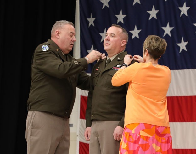 Tennessee’s Assistant Adjutant General-Army, Steven Turner, is promoted to the rank of brigadier general by Tennessee’s Adjutant General, Maj. Gen. Warner Ross, and Turner’s wife, Stacey, during a ceremony at the Tennessee National Guard’s Joint Forces Headquarters in Nashville, March 3. (photo by Lt. Col. Darrin Haas)