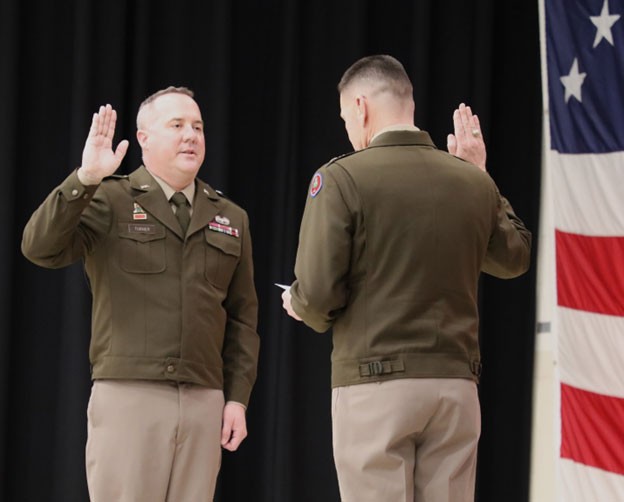 Brig. Gen. Steven Turner, Tennessee’s newest brigadier general, is sworn into his position by Maj. Gen. Jimmie Cole, Tennessee’s Deputy Adjutant General, during a ceremony at the Tennessee National Guard’s Joint Forces Headquarters in Nashville, March 3. (photo by Lt. Col. Darrin Haas)